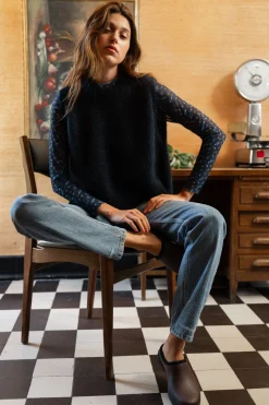 Pull sans manches Au coin du feu