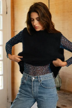 Pull sans manches Au coin du feu